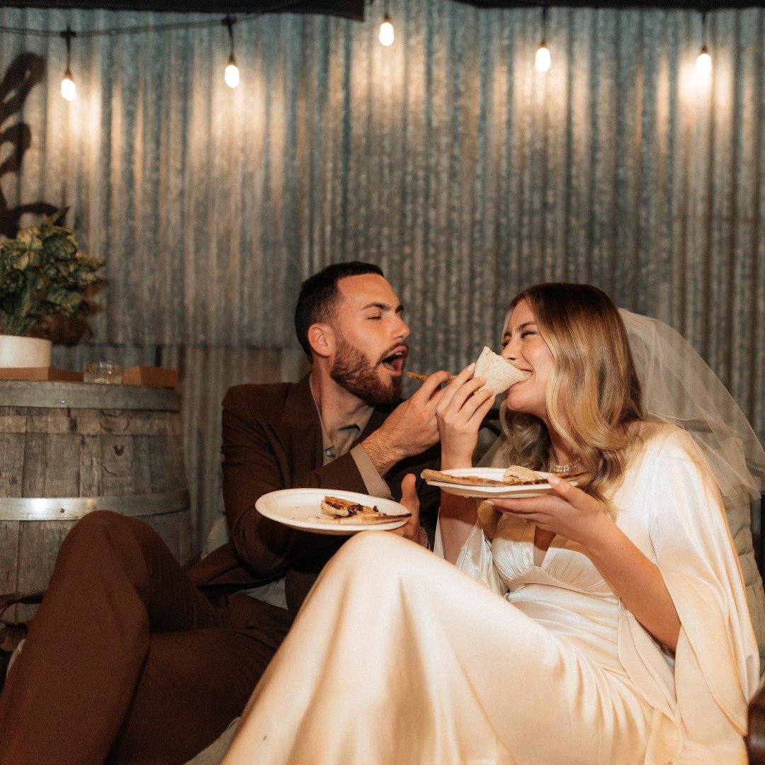 Love is... sharing a slice on your big day 🍕❤️ Here's to laid-back moments and delicious memories with the ones who matter most. 

#PizzaAndLove #WeddingWhimsy #TheBlackBrisbane

📸 @lovelenscapes
