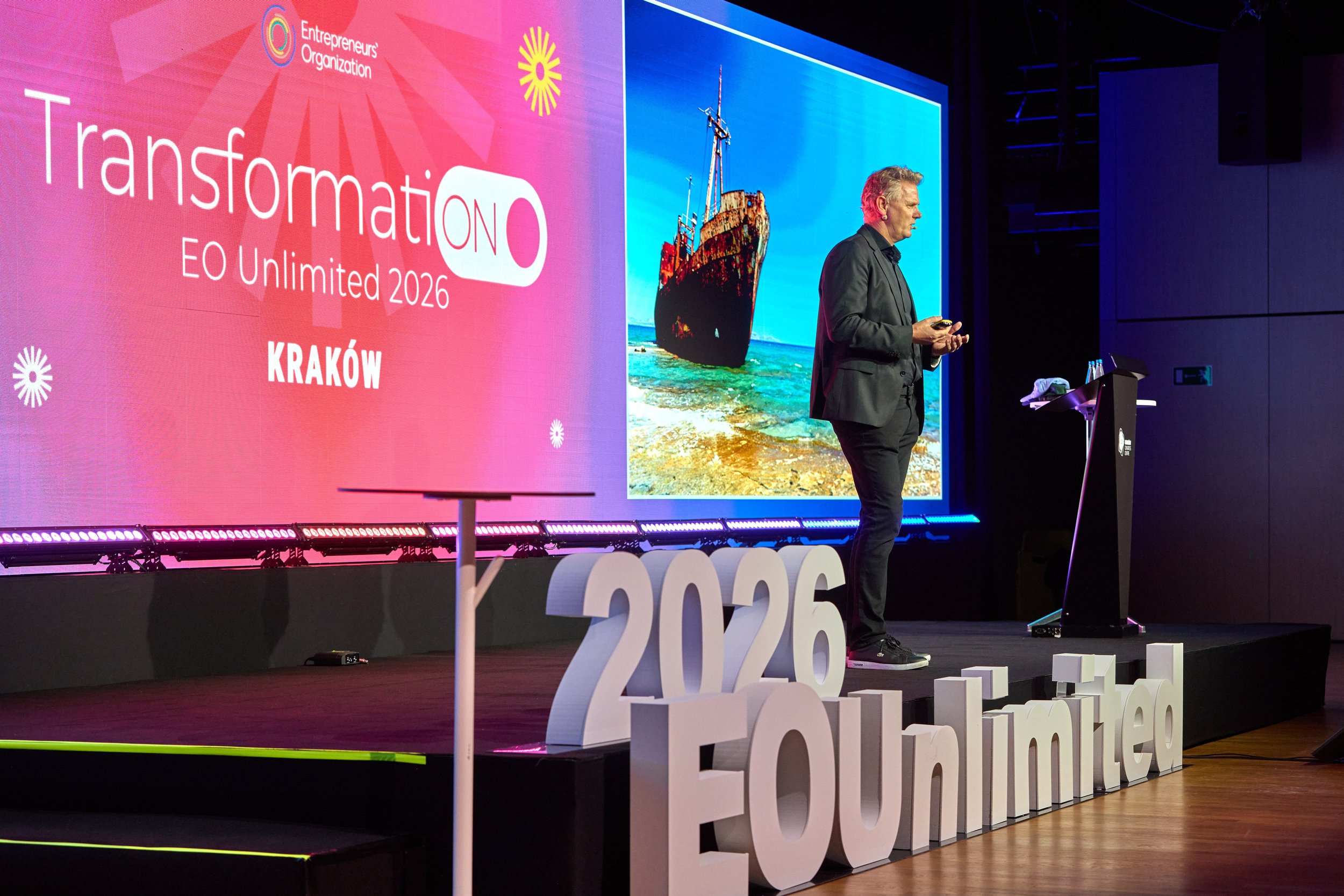 Caspar Craven delivering a transformation keynote at EO Unlimited 2026 in Krakow