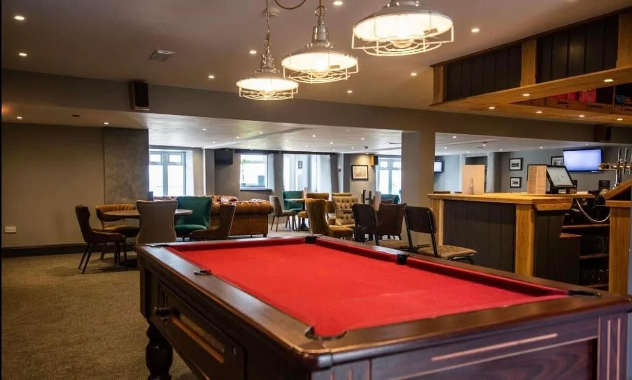 Feeling competitive? Take on friends, family or other guests at the pool table!