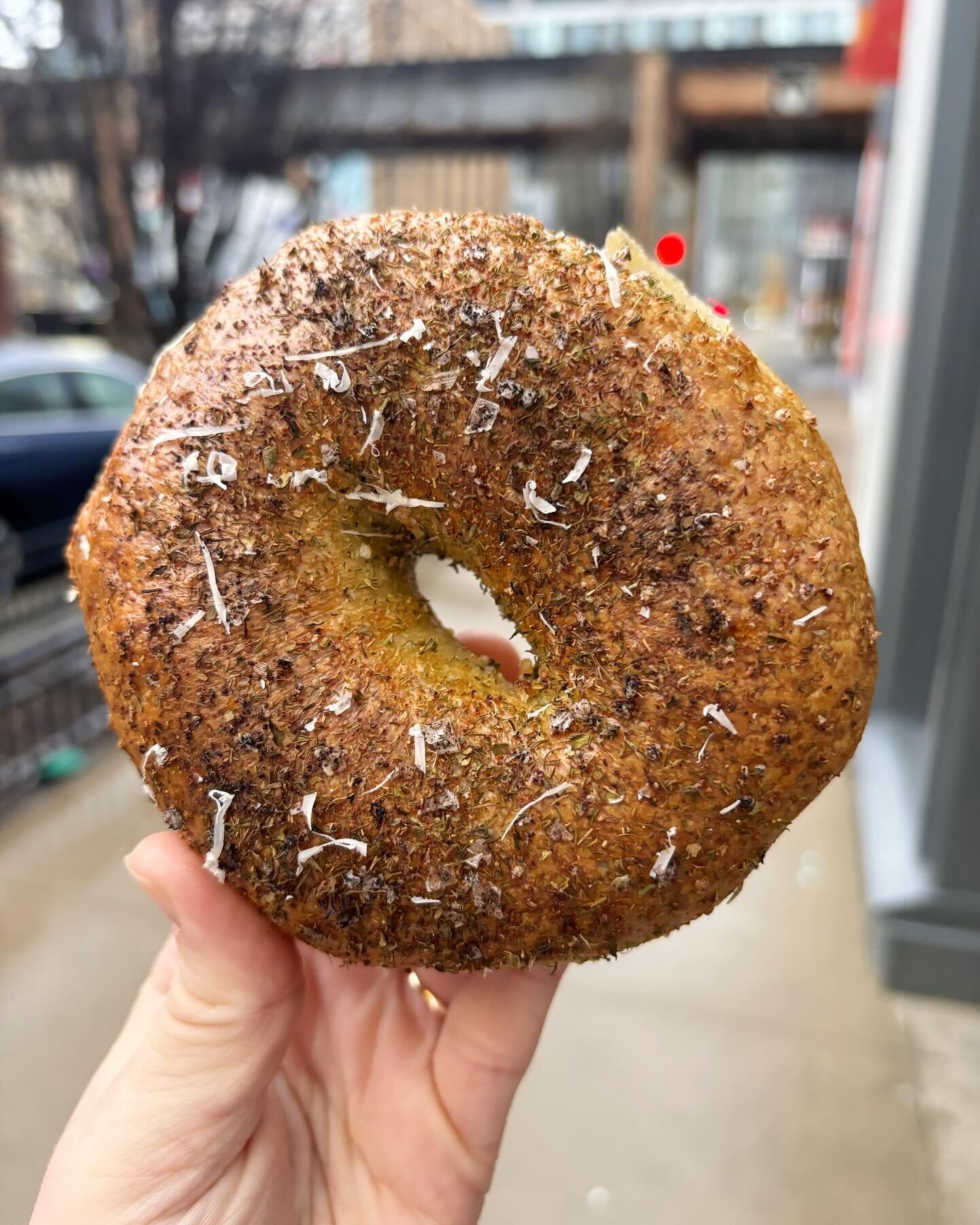 Pesto Bagel! This week&rsquo;s BOTW is made with a homemade (and nut-free) pesto using basil, dill, parmesan, and extra virgin olive oil! Topped with an herb salt! This week only! 🥯🌿🌱🧀