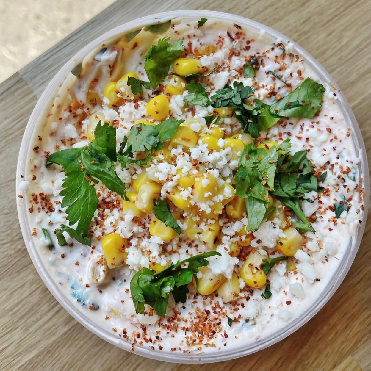 Elote Cream Cheese is back! 🌽🍋&zwj;🟩🌶️ Sweet corn, cilantro, cotija cheese, and Tajin! For a limited time!