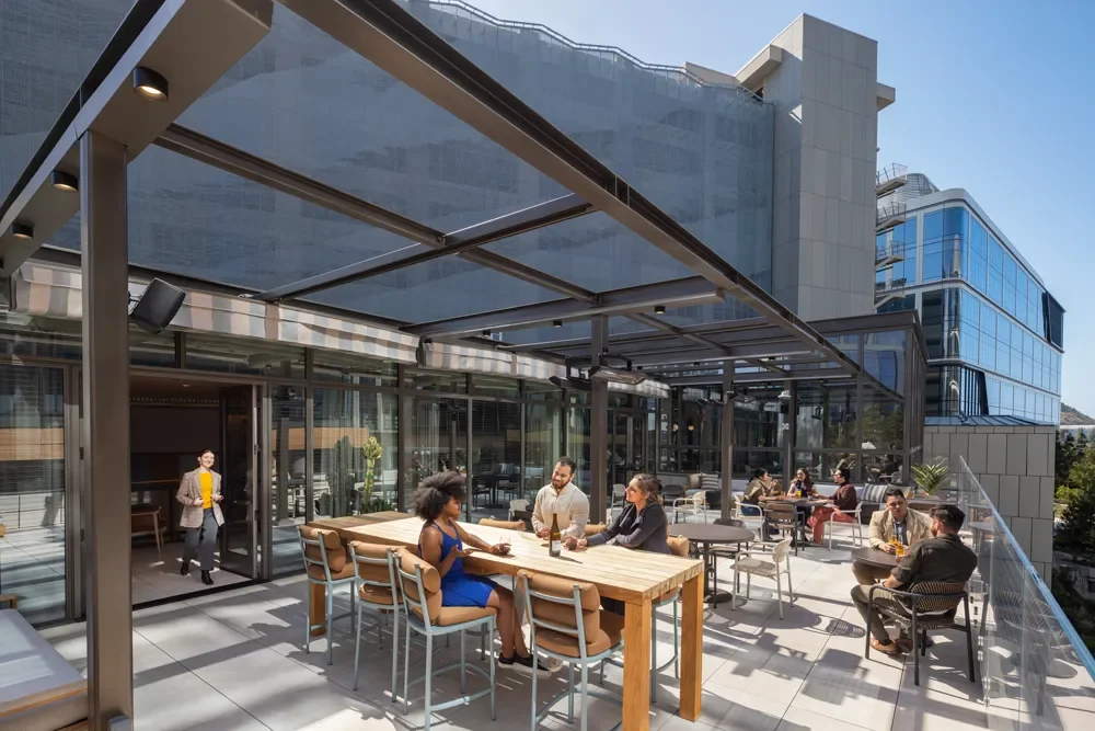 lawrence-anderson-kilroy-oyster-point-patio-dining.webp