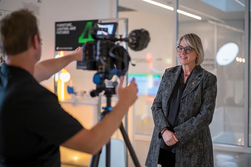 Speaker addressing attendees during ISS LA Fire Relief