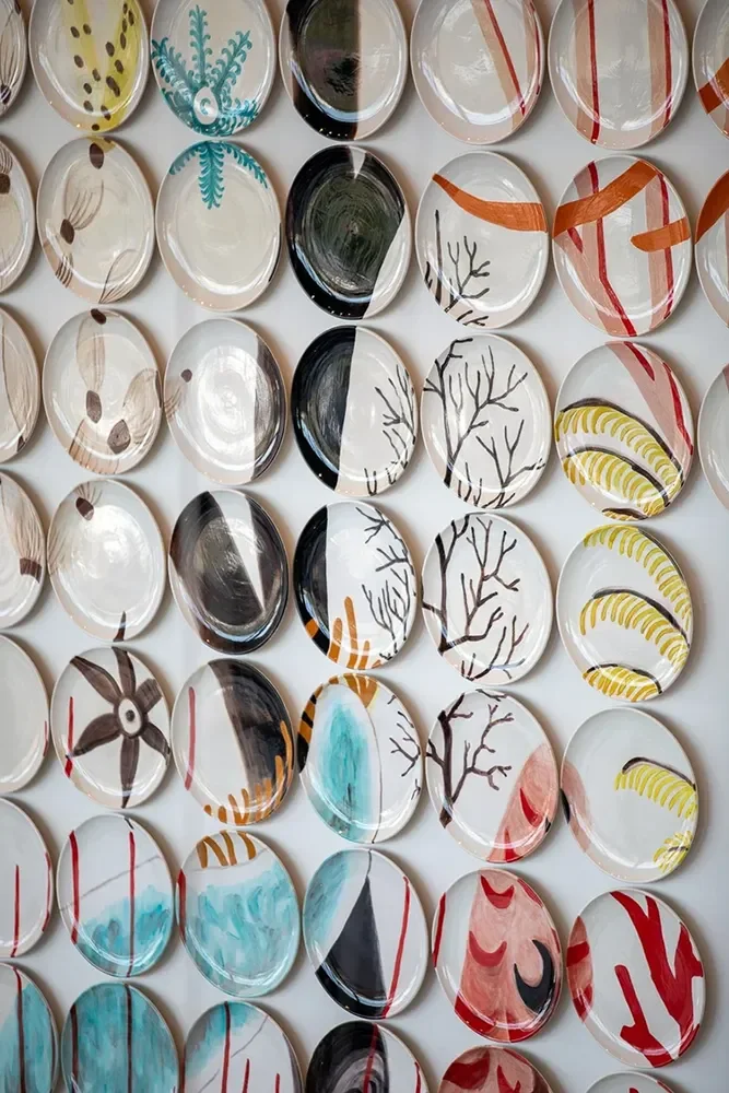 lawrence-anderson-ceramic-plates-wall-installation.webp