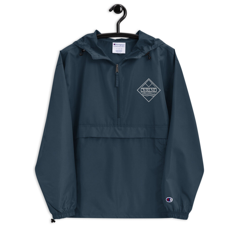 embroidered-champion-packable-jacket-navy-front-6101e3c86a926.jpg