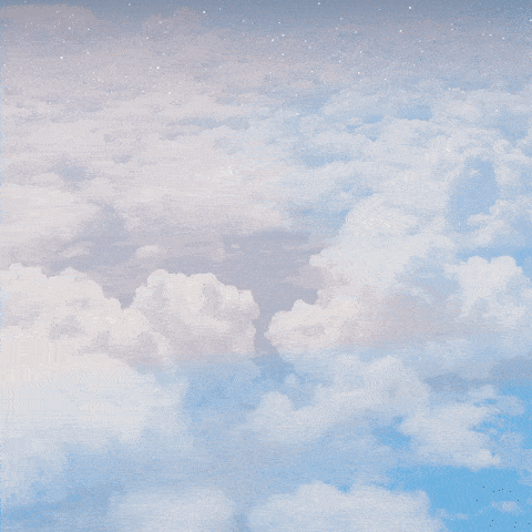 Clear blue sky with scattered white clouds.