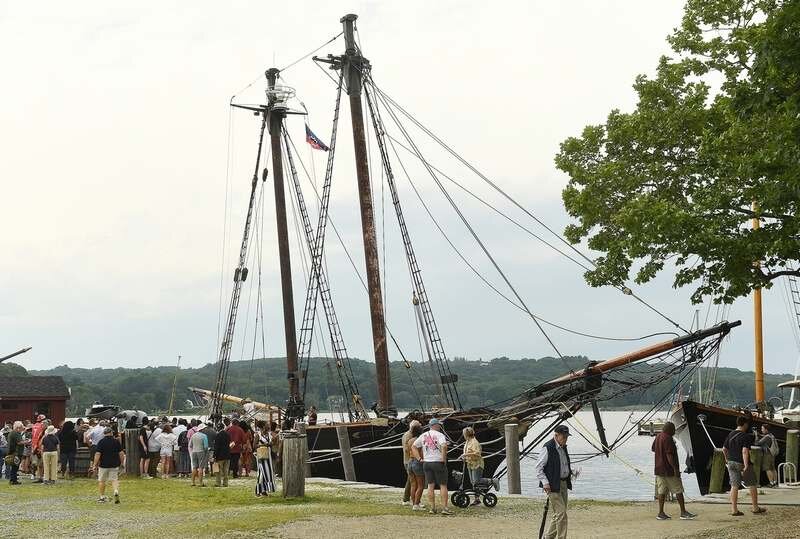  People gather to listen to a dockside talk before tours of the replica schooner Amistad were available after an event with music, panel discussion and a Juneteenth Freedom march to the Amistad during the Juneteenth celebration Saturday, June 19, 202