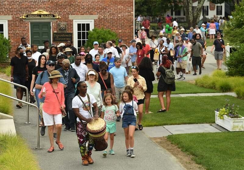  After an event with music and a panel discussion master drummer Gerard Hector leads the crowd on a Juneteenth Freedom march to the replica schooner Amistad on Saturday, June 19, 2021, at Mystic Seaport Museum.&nbsp; (Dana Jensen/The Day) 