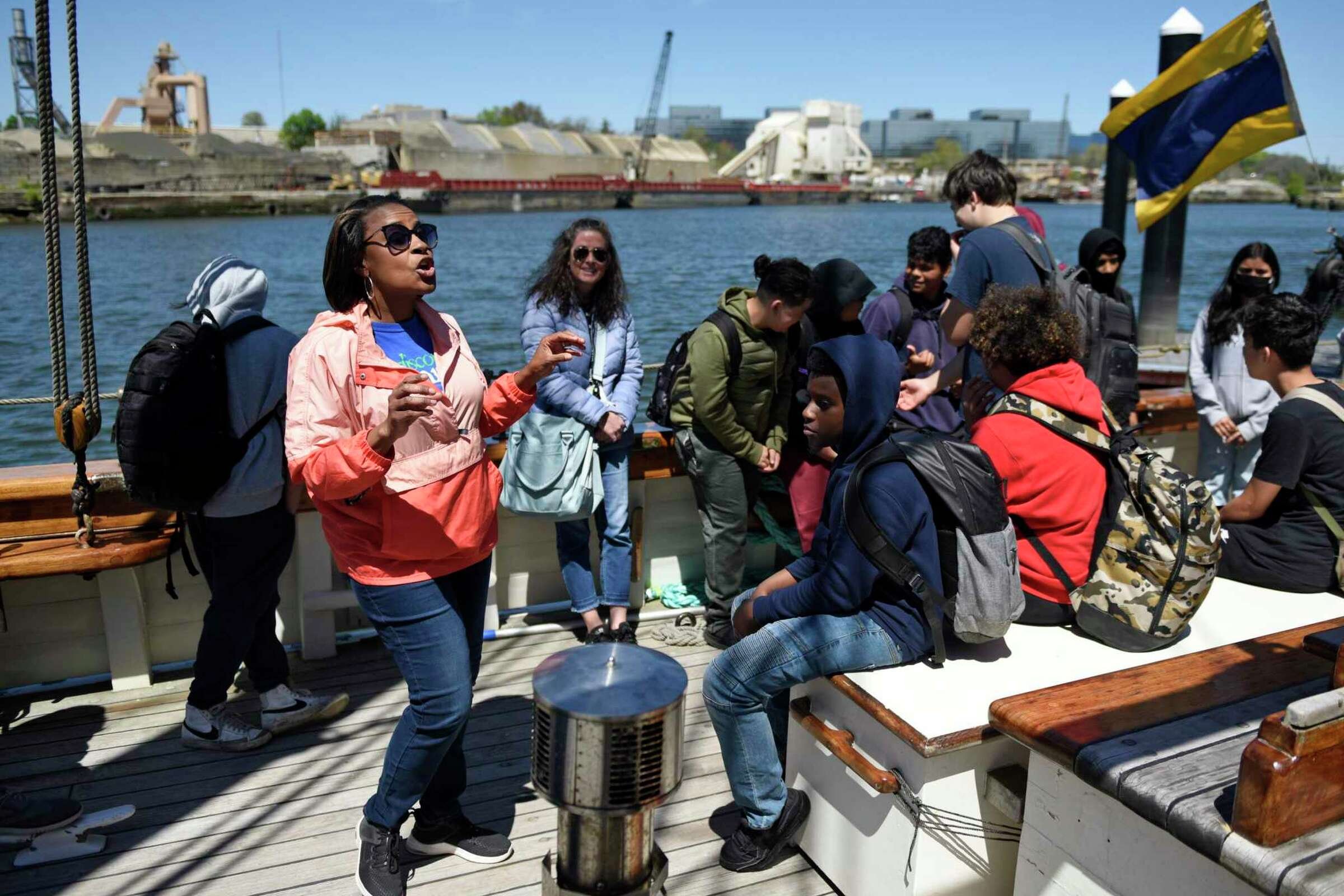  Discover Amistad educator Reeshemah Nofleet tells students the history of the Amistad uprising aboard a reproduction of the ship docked at Harbor Point in Stamford, Conn. Monday, May 9, 2022. Eighth grade students toured the ship to kick off the new