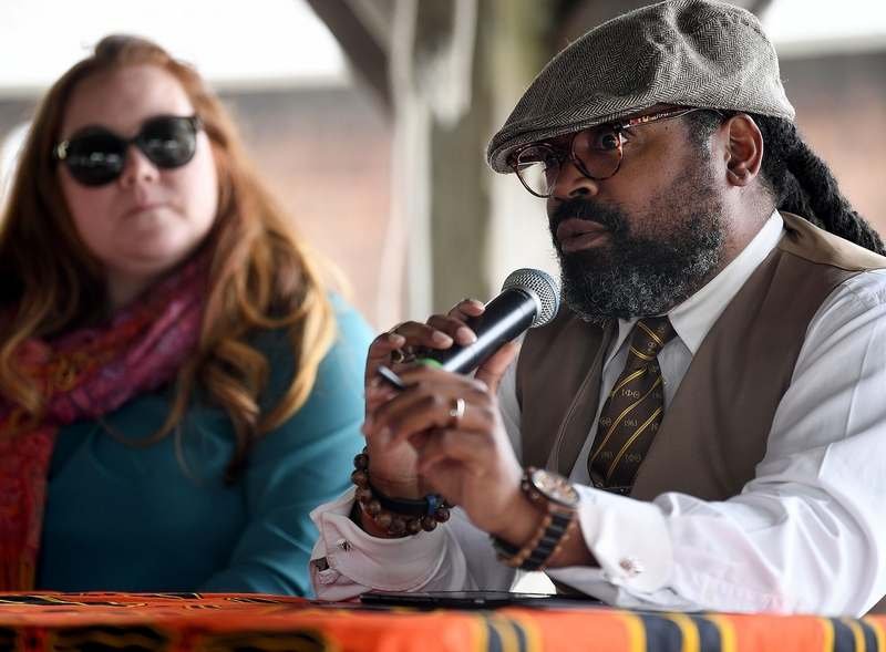  Panelist Kendrick Roundtree speaks as Fionn Darby-Hudgens listens during a Juneteenth Celebration at the Mystic Seaport Museum on Sunday, June 19, 2022. The museum partnered with Discovering Amistad for the third year to celebrate the national holid