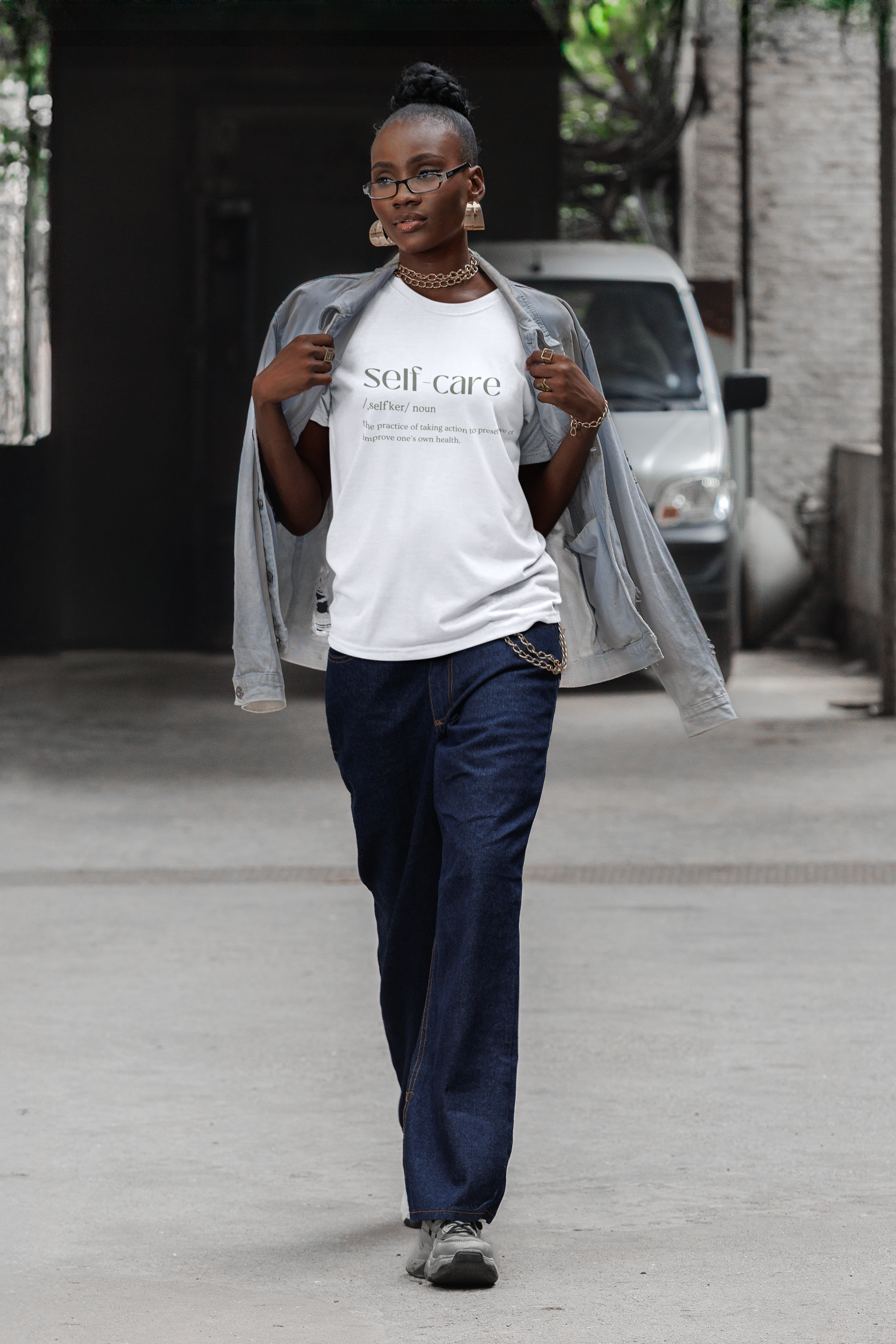 round-neck-t-shirt-mockup-of-a-serious-woman-walking-by-an-urban-setting-m55892.png