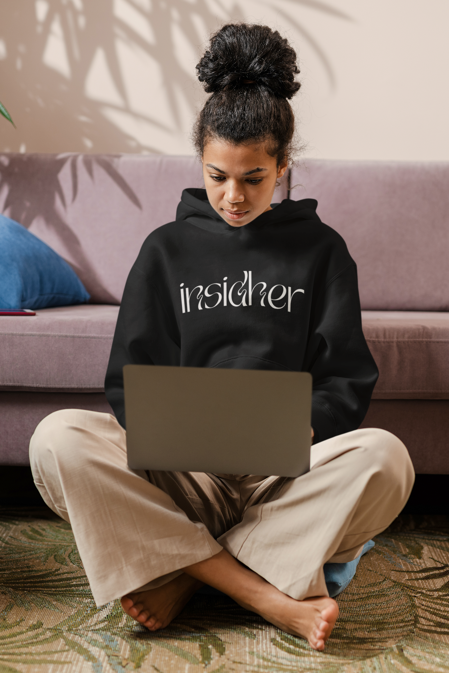 pullover-hoodie-mockup-featuring-a-woman-working-on-her-laptop-m25423-r-el2.png