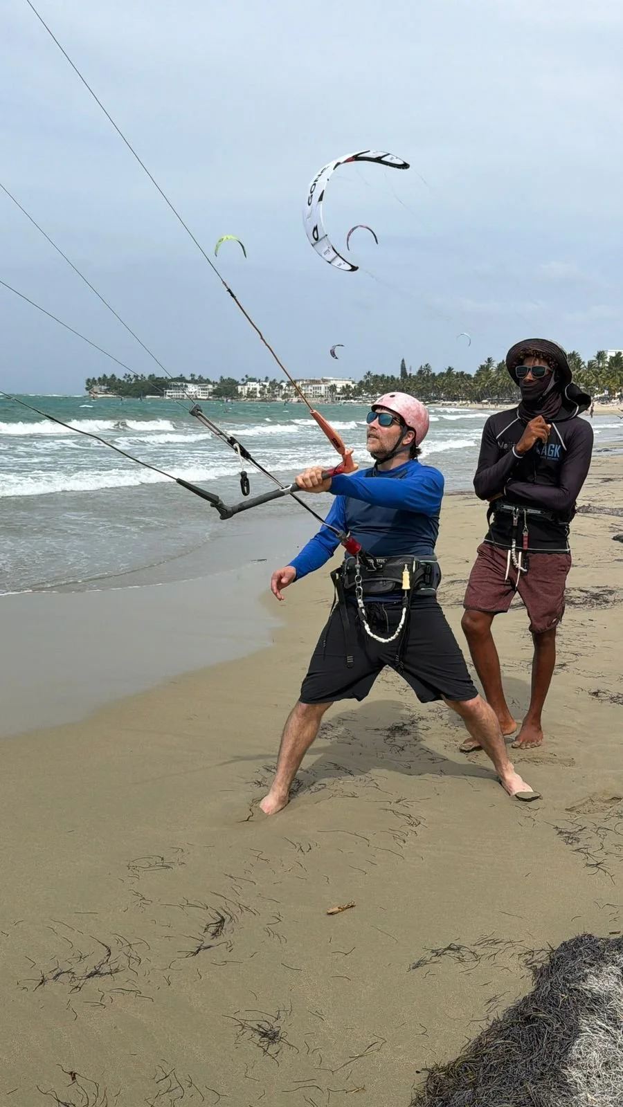 Kiteboarding instructor coaching a student one-on-one in Cabarete