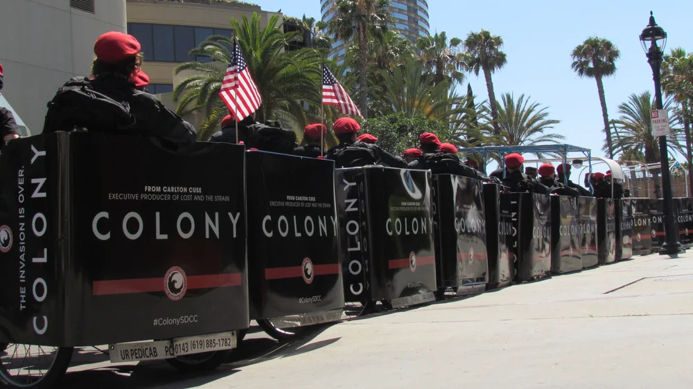 Fleet of black wrapped pedicabs