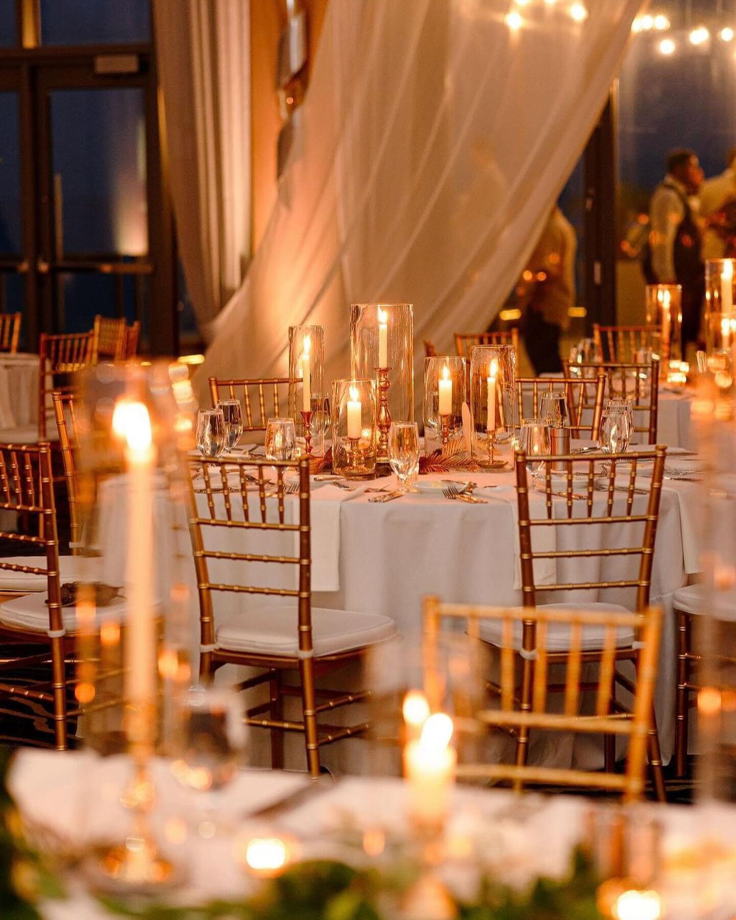 We loved how Madi incorporated golds &amp; blush tones into her color palette, they complimented the lighting design beautifully. The candles were one of our favorite details, along with the floral design &amp; boxwood wall. What details are your fav