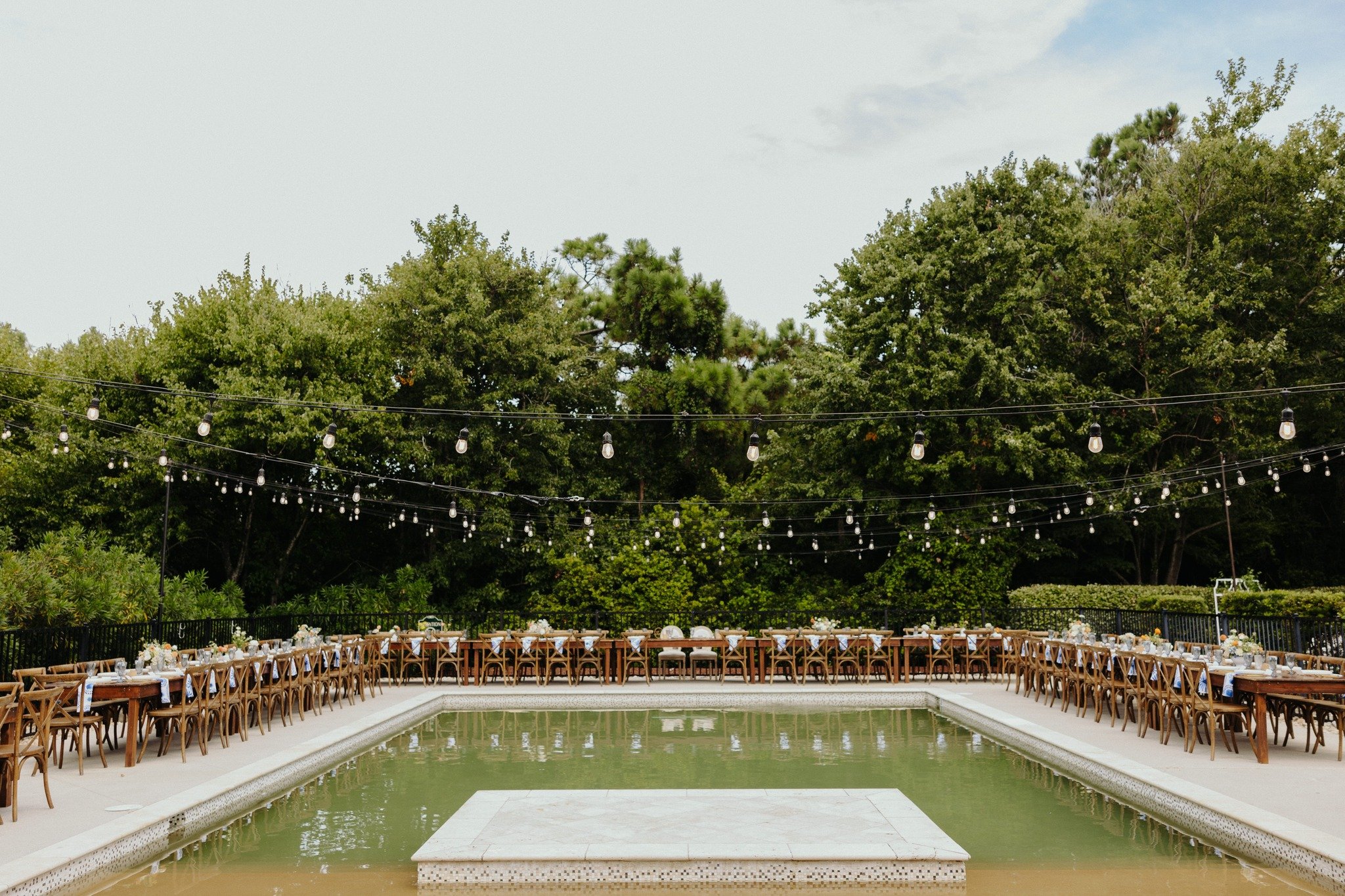 It should be mandatory that all pools have cafe lights overhead 😏

📸 : @sarahdambraphoto
Event Planners: @coastyleweddings
Venue: @theblackstallionobx
Floral design: @honeysuckleevents.obx
Rentals: @metro_rental , @prettylittlethingsobx, @rarityren
