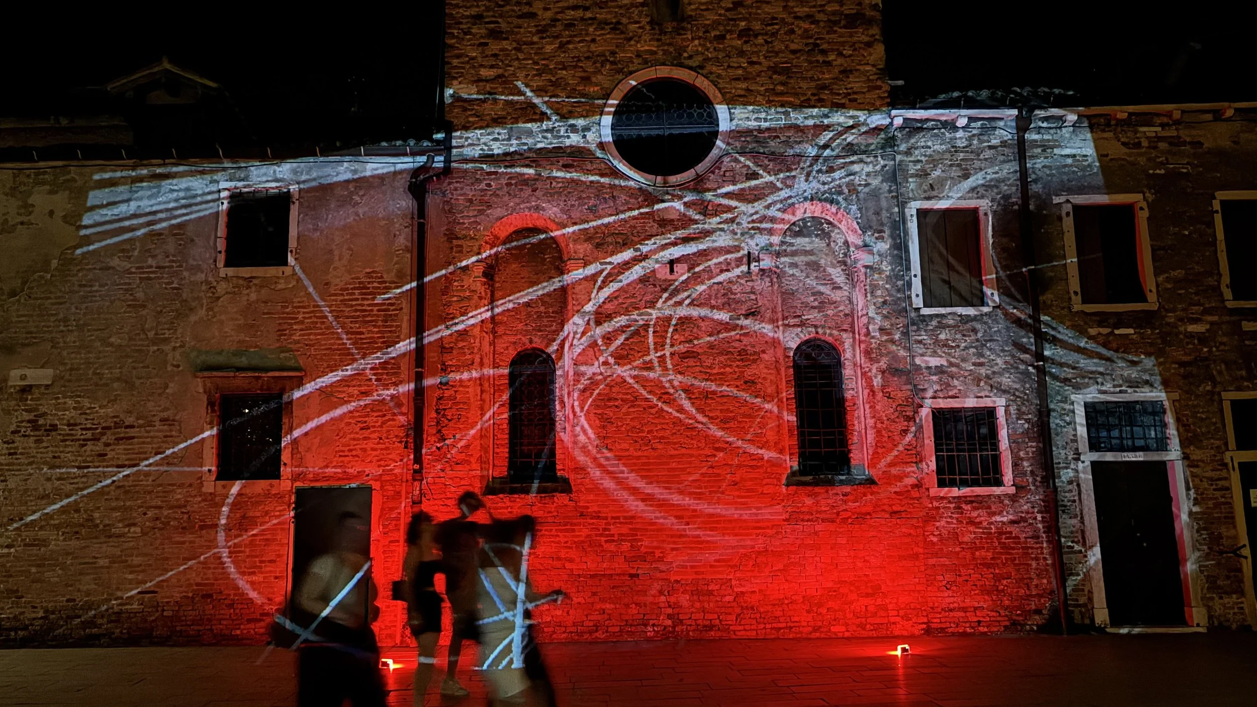 Visual Music time-based projections with visitors: — Campo San Giacomo