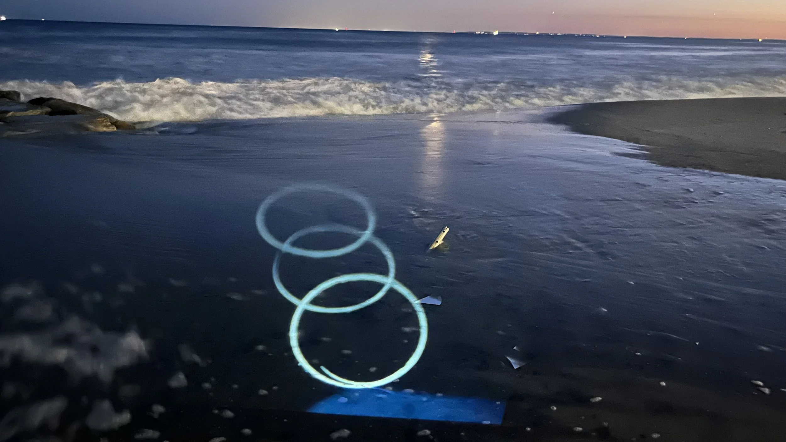 Time-based projection — ocean, sand.