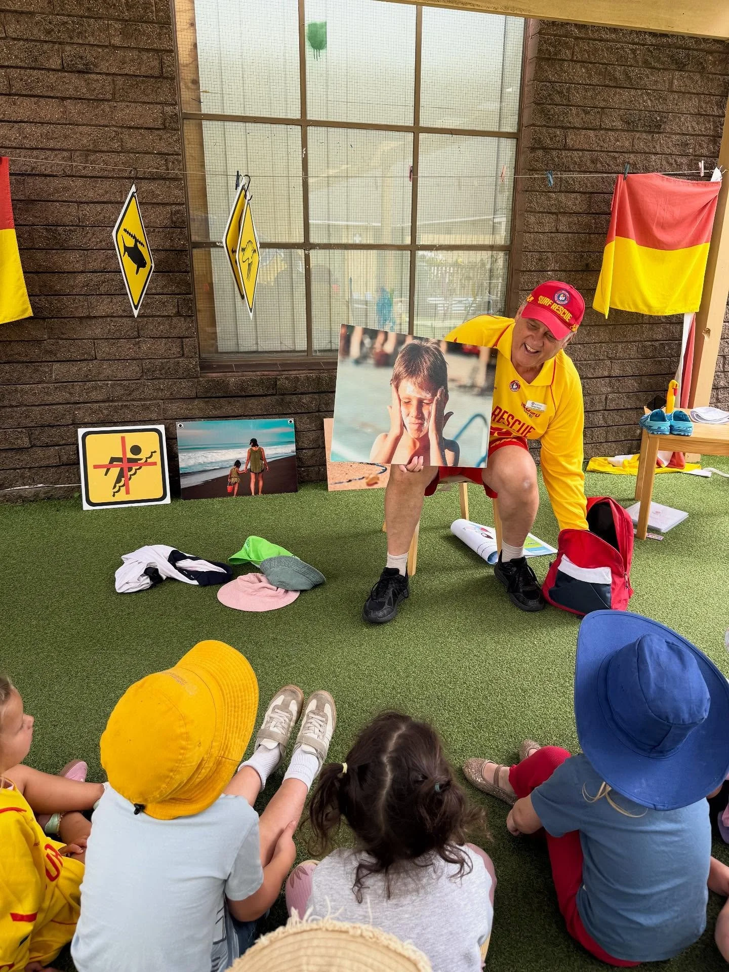 🌊 Annie &amp; the Waves at WCK! 🌊
Today our children had an exciting visit from Surf Life Saving NSW for a fun and interactive beach safety session. 

The children got to try on real Surf Life Saving uniforms and learned the difference between the 