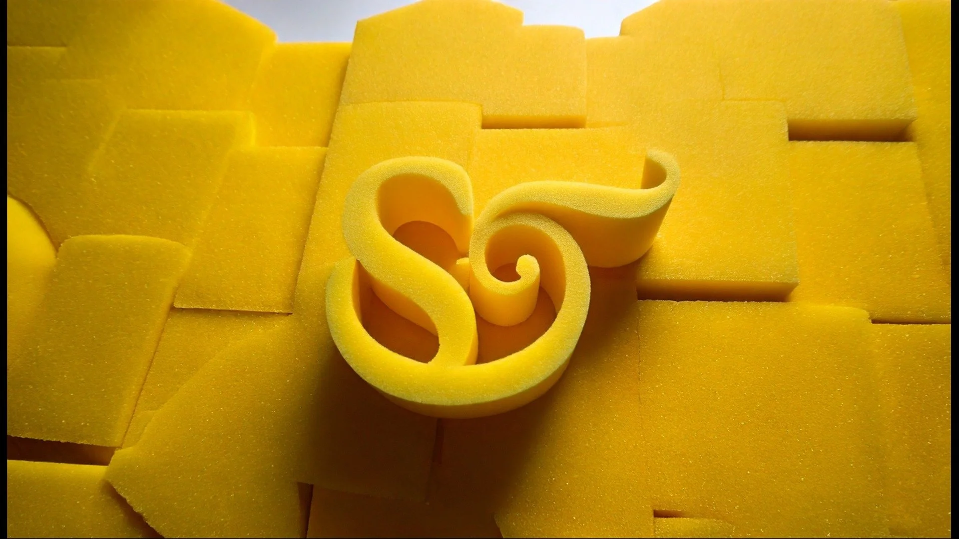 Yellow_foam_shapes_abstract_202608061703.jpeg