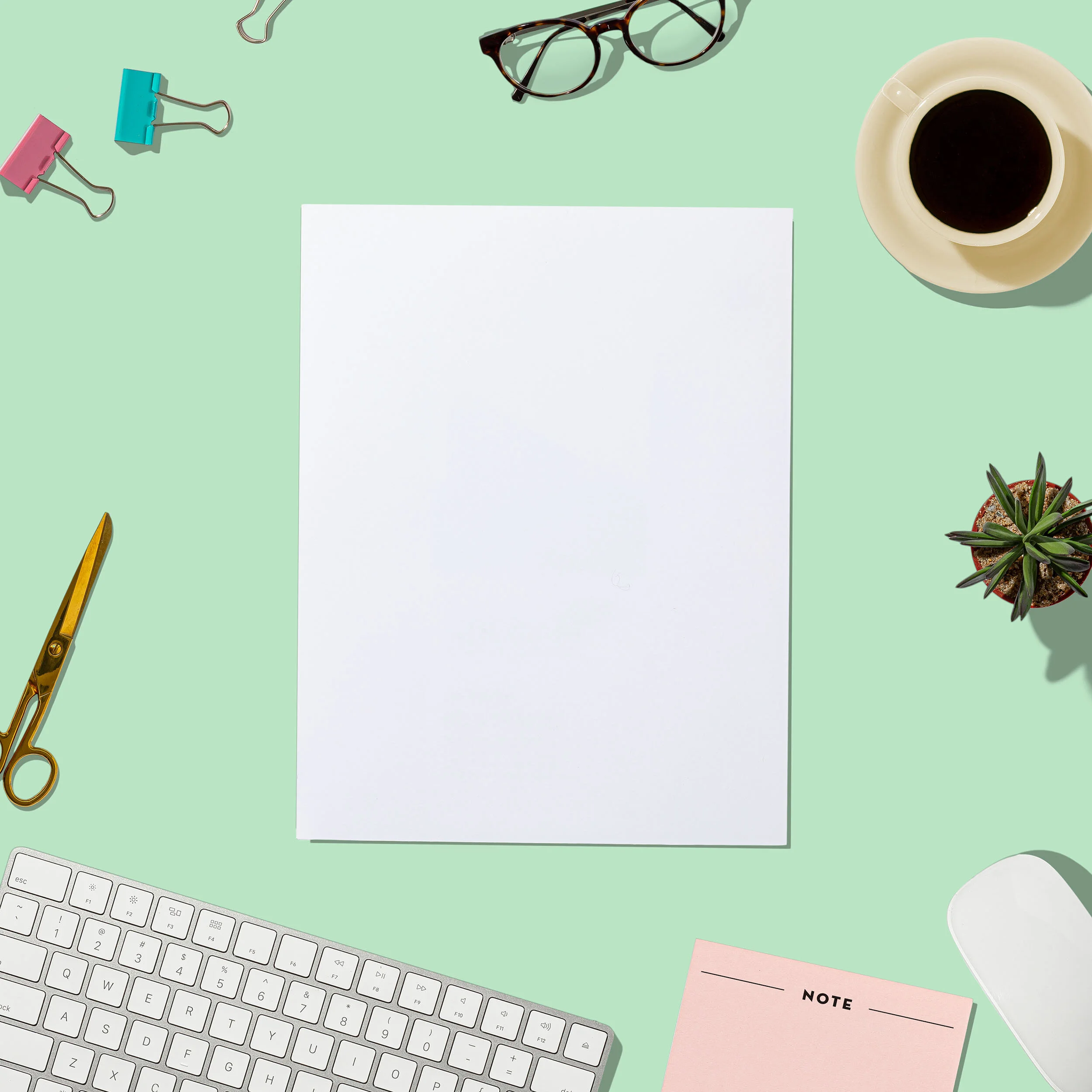 Scenic shot of the beach with waves hitting the rocks.