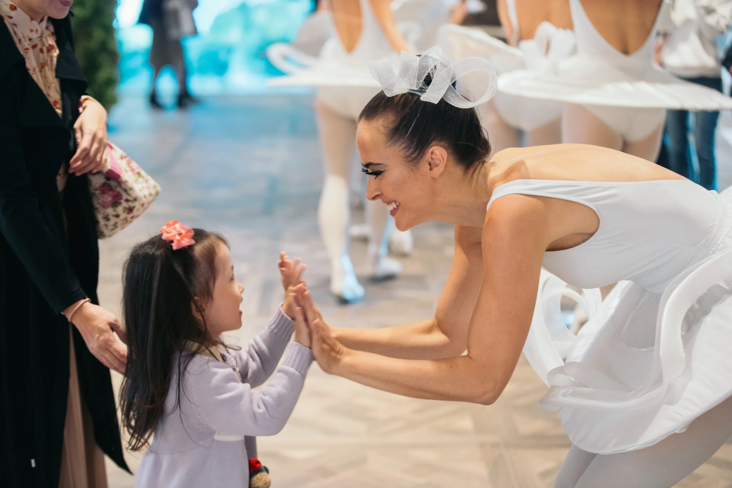A BPM Productions Hong Kong ballerina interacts with a young guest during the 2019 grand opening of K11 MUSEA, highlighting the event's immersive atmosphere.