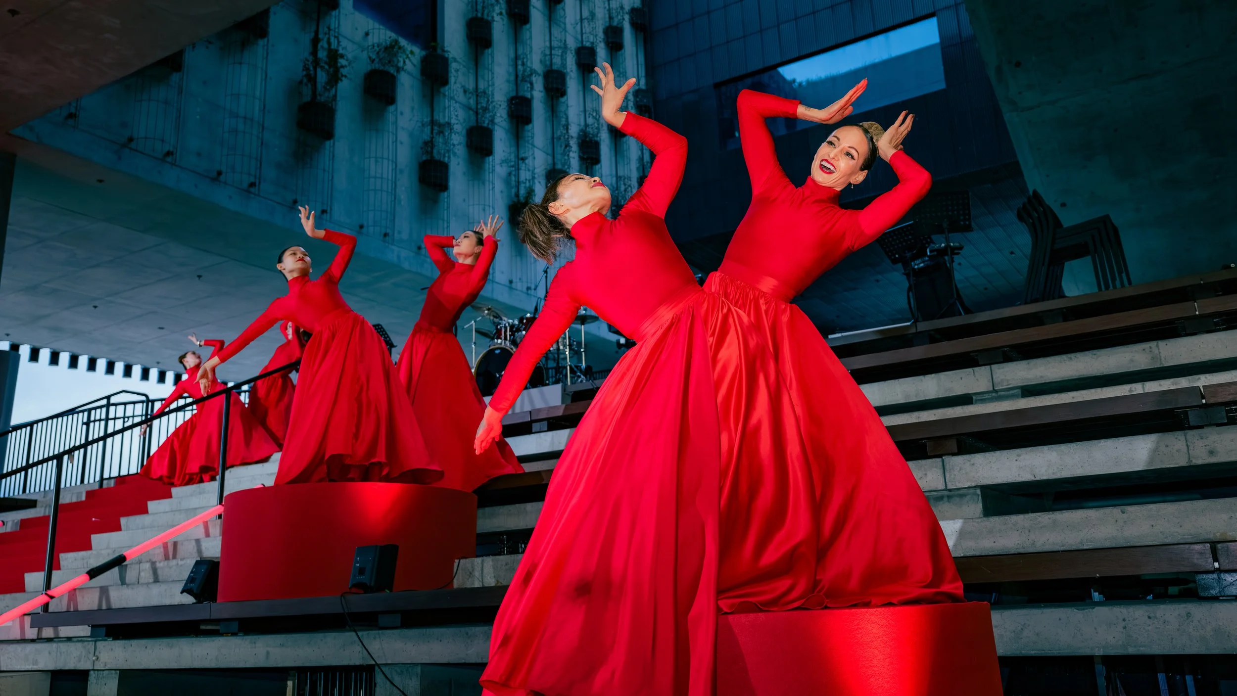 LIV Golf Hong Kong opening ceremony featuring a contemporary dance performance with dancers in red.
