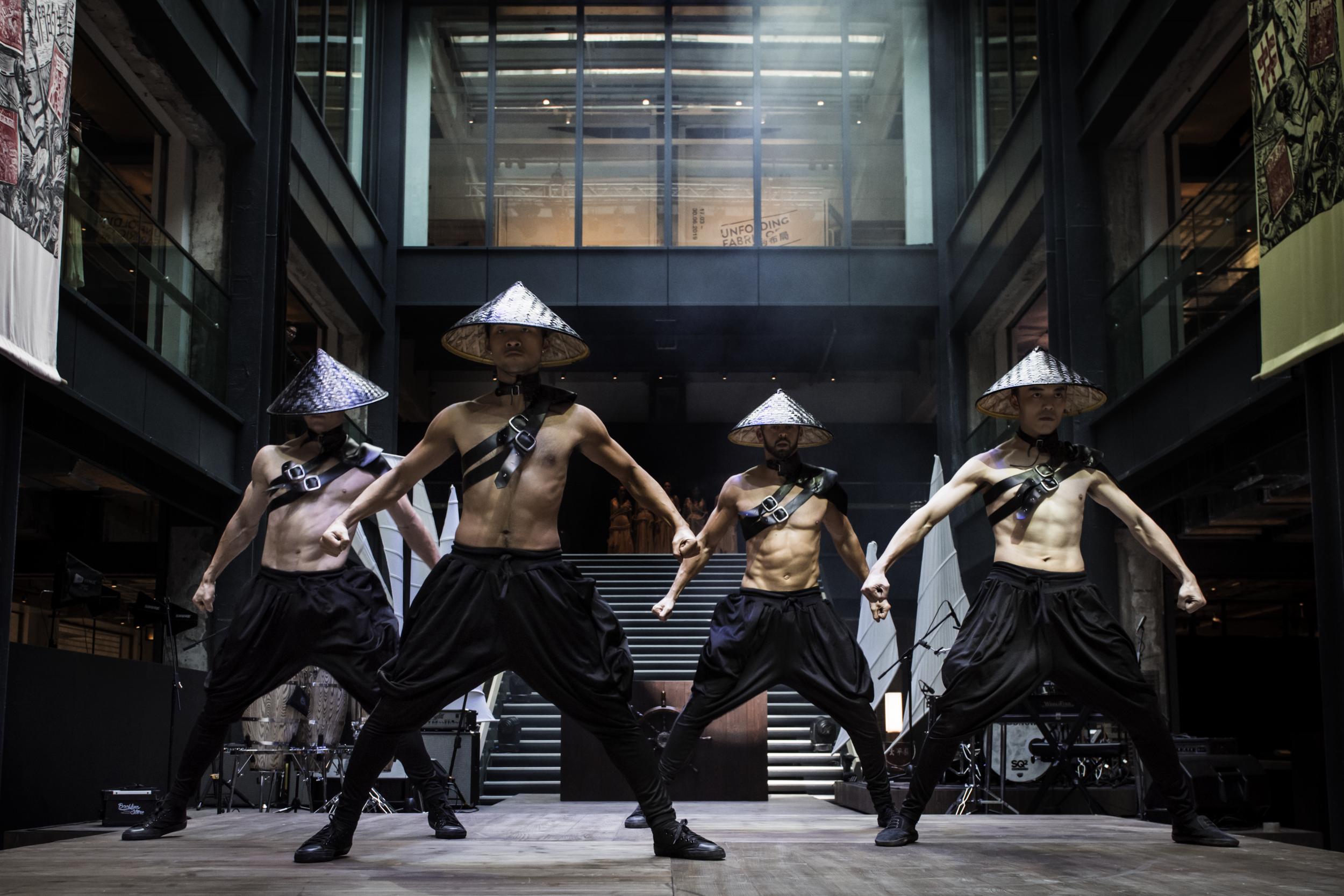 Fusion east meets west male dancers.png