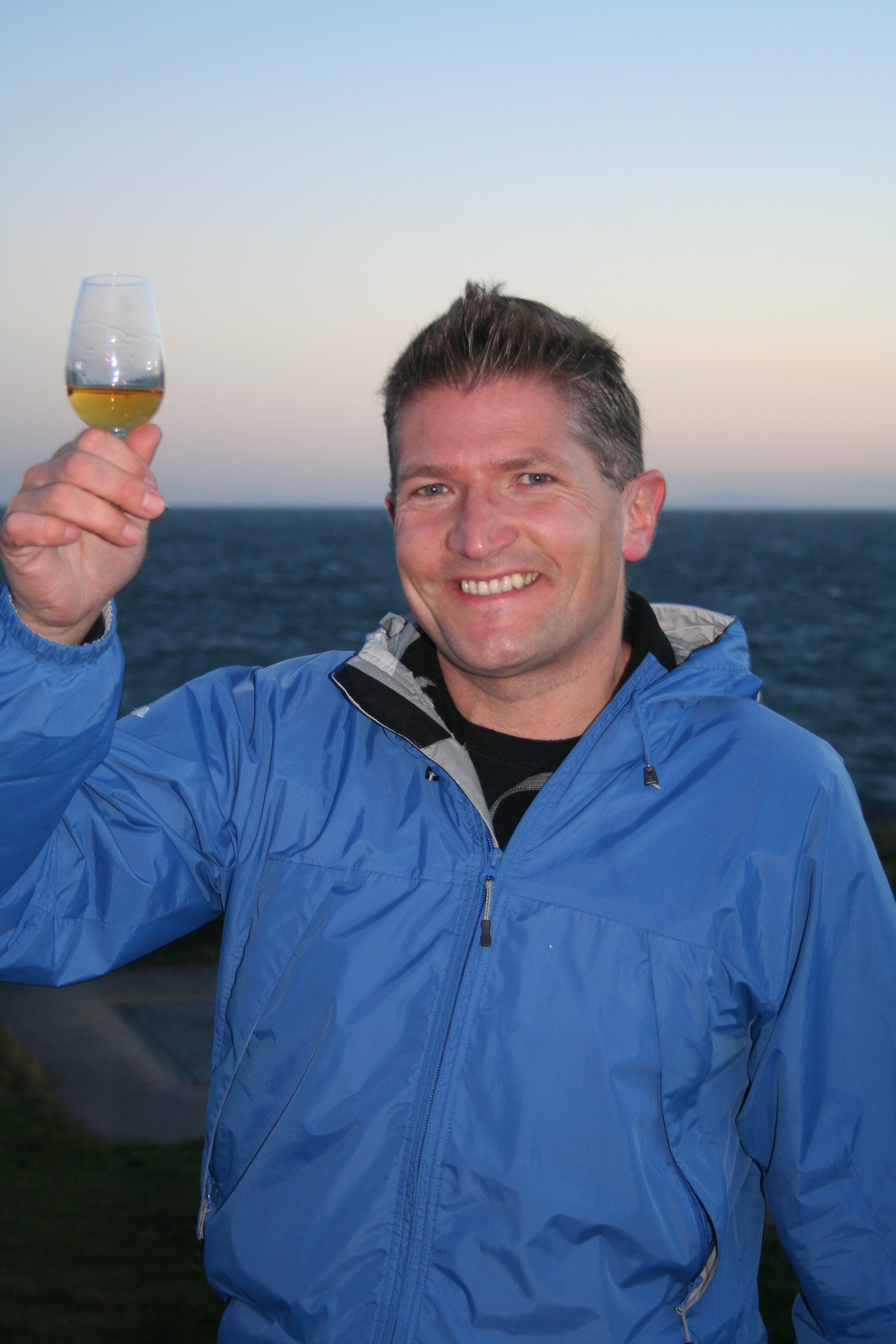 Robin sampling whisky on Islay.JPG