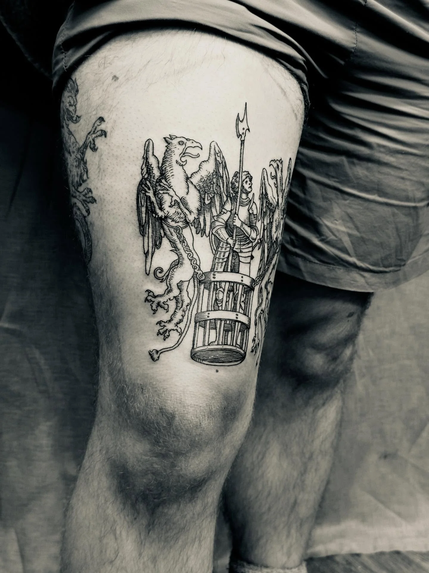 Alexander being hoisted aloft by two griffins for Owen