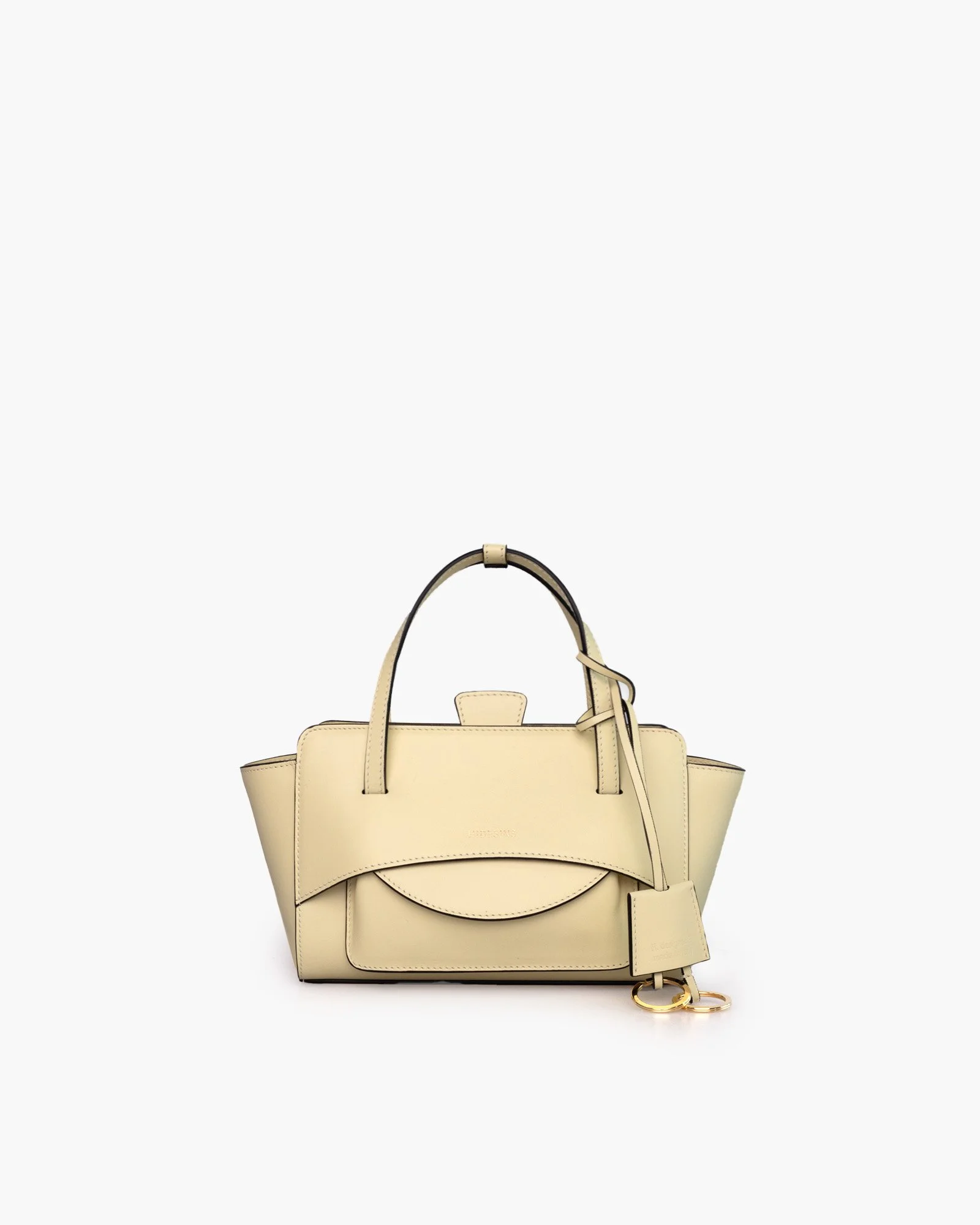 Détail fermeture magnétique invisible, sac structuré coloris Butter