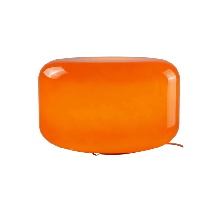 Lampe Livo orange allumée, ambiance lumineuse chaleureuse.