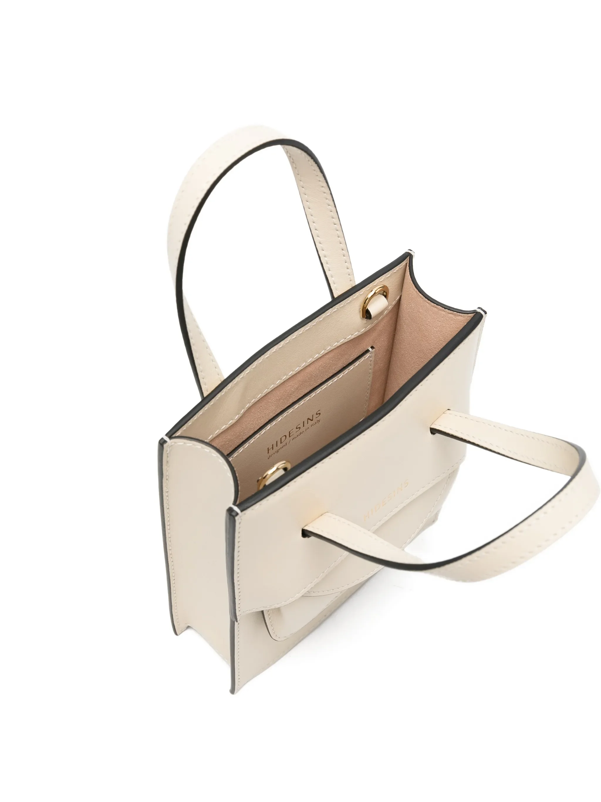 ntérieur doublé coton du Flap Mini Sauge — poches organisées, sachet secret intégré à la poignée, artisanat soigné