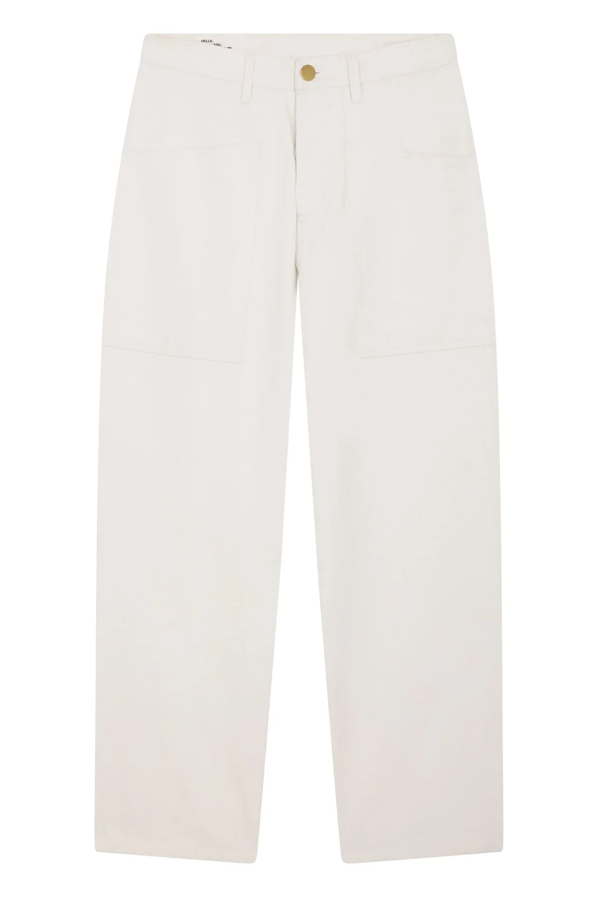 Zoom sur la matière coton texturée du pantalon écru