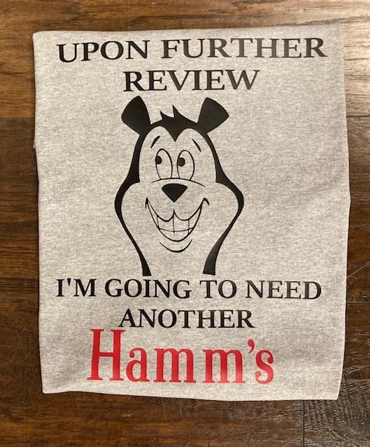 Show off your love for classic beer and witty humor with this Upon Further Review I'm Going To Need Another Hamm's Drinking Beer T-Shirt.