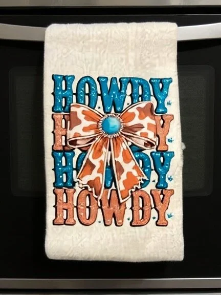 Howdy towel over oven.jpg
