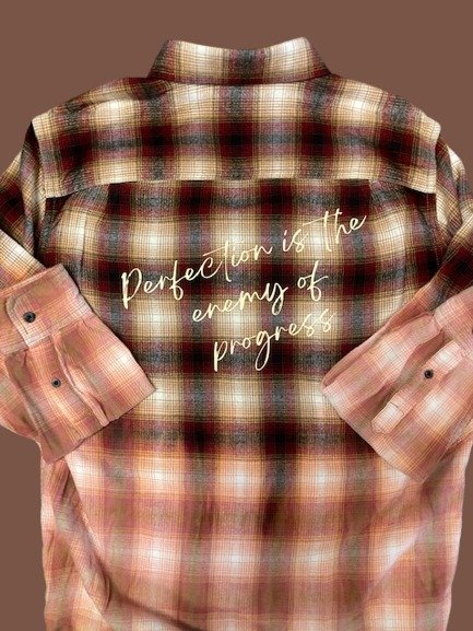 Perfection is the enemy of progress distressed flannel shirt