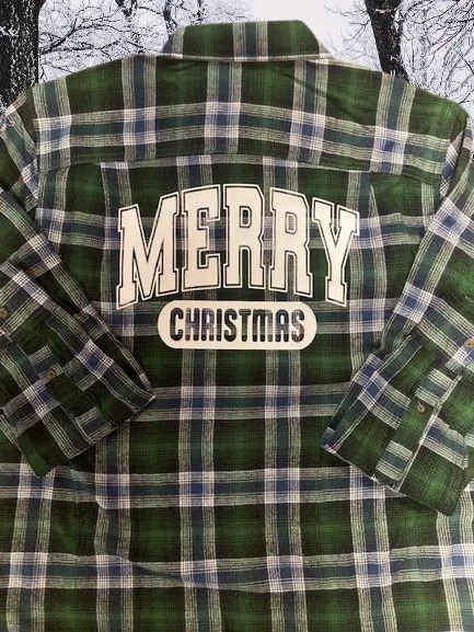 Embrace the holidays with our "Merry Christmas" Flannel! Featuring a festive design on the back, this cozy flannel is perfect for holiday gatherings and winter wear