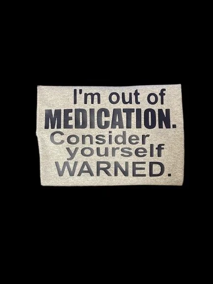 Get a laugh with this edgy t-shirt featuring the witty saying: 'I'm Out of Medication. Consider Yourself Warned.' Comfortable, durable, and perfect for humor lovers or unique gift ideas!