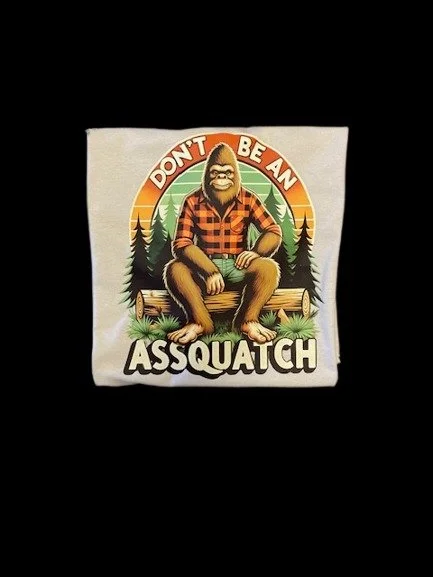 Don’t Be an Assquatch Funny Bigfoot T-Shirt by Granny and Grandpa’s Custom Creations in Buffalo Minnesota