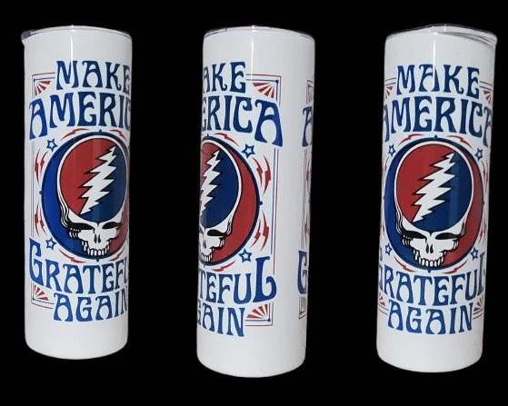 Stay bold with this 20-ounce stainless steel travel mug featuring skulls and the statement "Make America Grateful Again." Keeps drinks hot or cold for hours!
