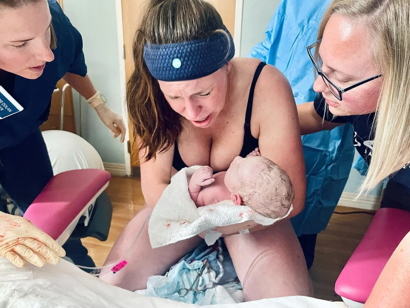 woman birthing on hands and knees at NAS Jacksonville Hospital-with doulas of Jacksonville