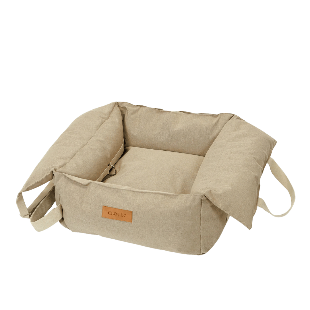 Luxury dog car seat by Stokeshire Lifestyle, featuring the Cloud7 Getaway design with a doodle puppy riding securely inside a premium vehicle.
