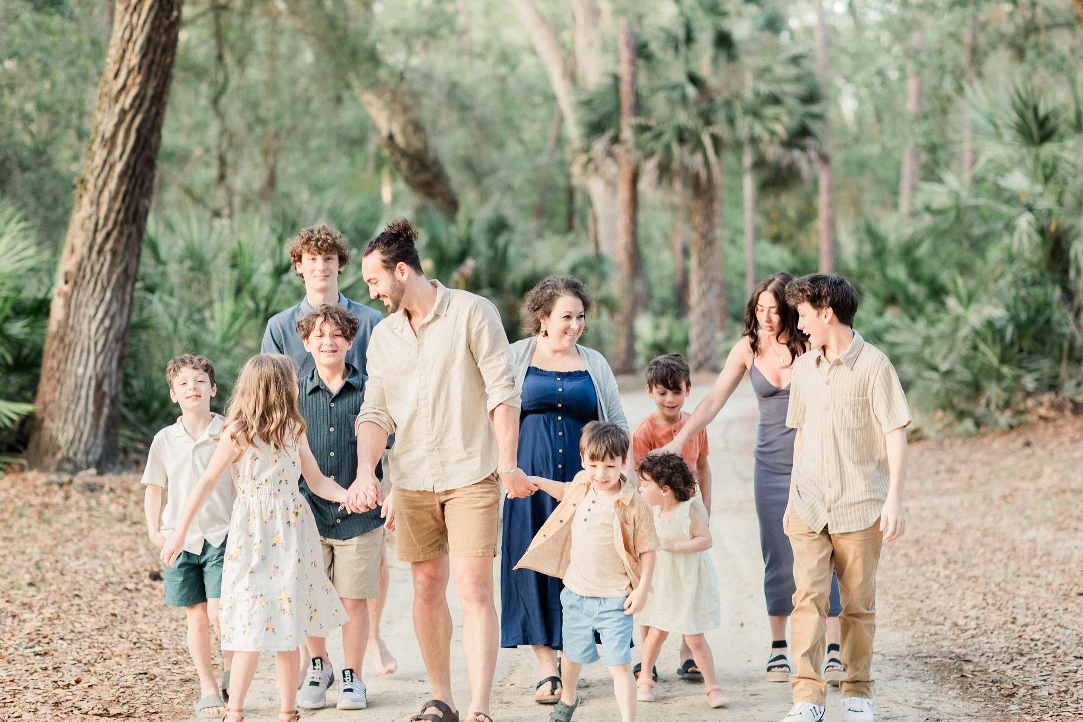 A family walking together outdoors, reflecting patience, care, and intentional family life.