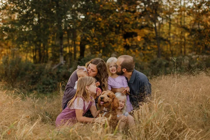 Family in the Midwest with their doodle puppy from Stokeshire Designer Doodles in Wisconsin.