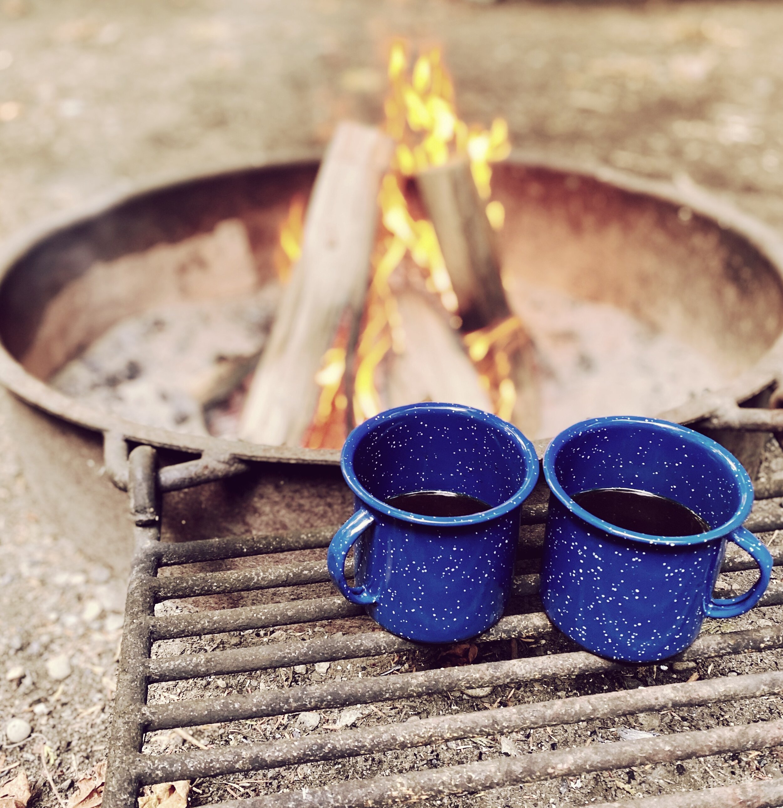 Morning coffee by the campfire