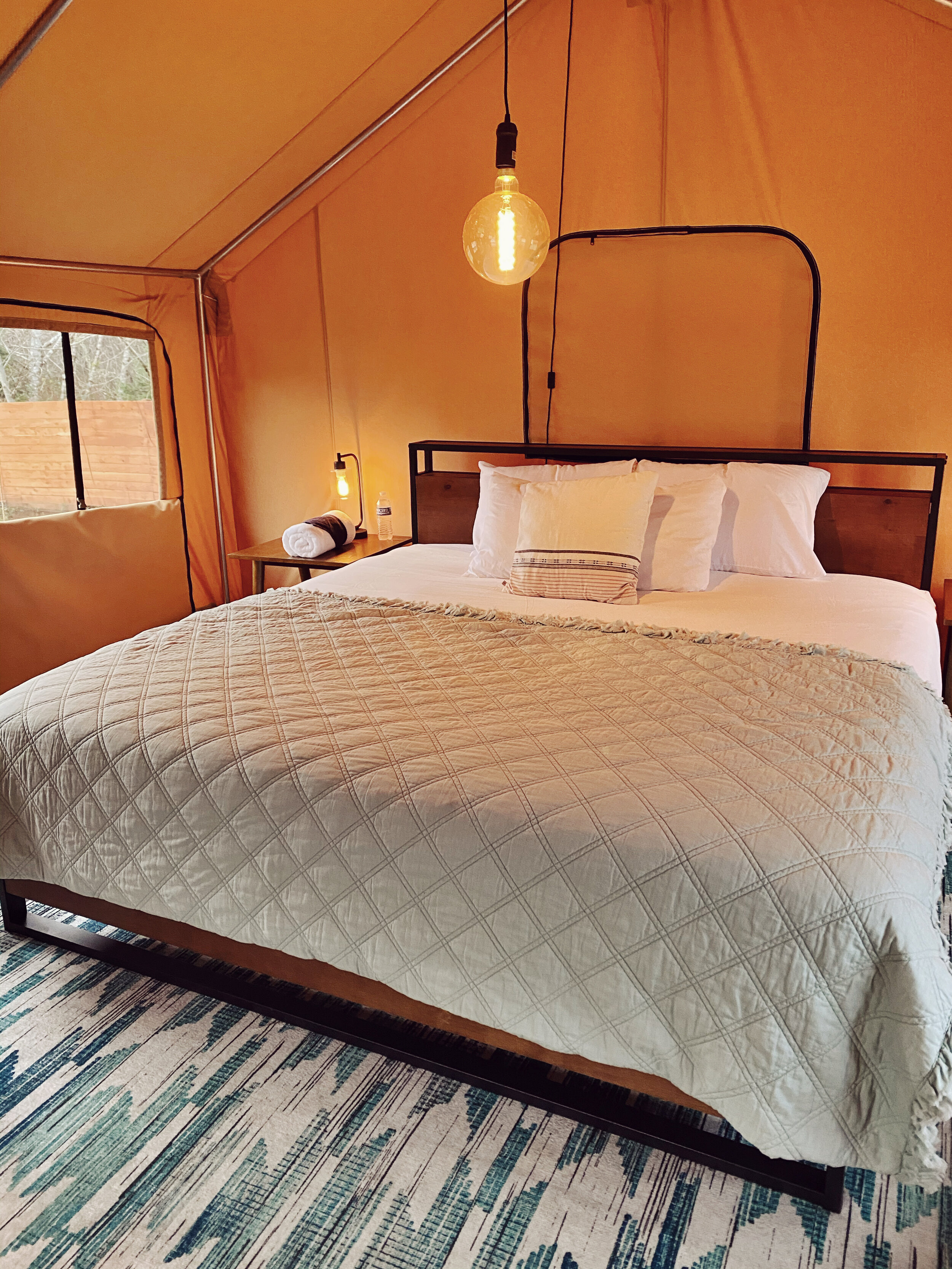King sized bed in glamping tent at the Pacific Dunes Resort Copalis Beach Washington 