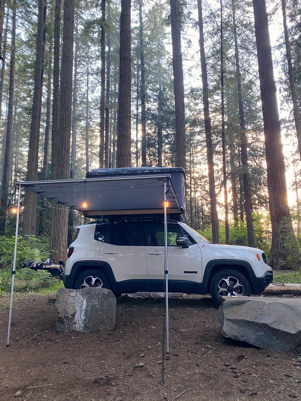 Jeep Renegade Trailhawk White with Roofnest Sparrow and Roam Canopy with Barebones Living Lanterns