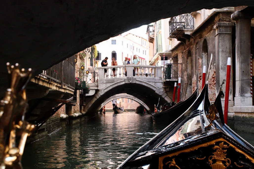 A gondola ride through crowded canals. Venice, Italy