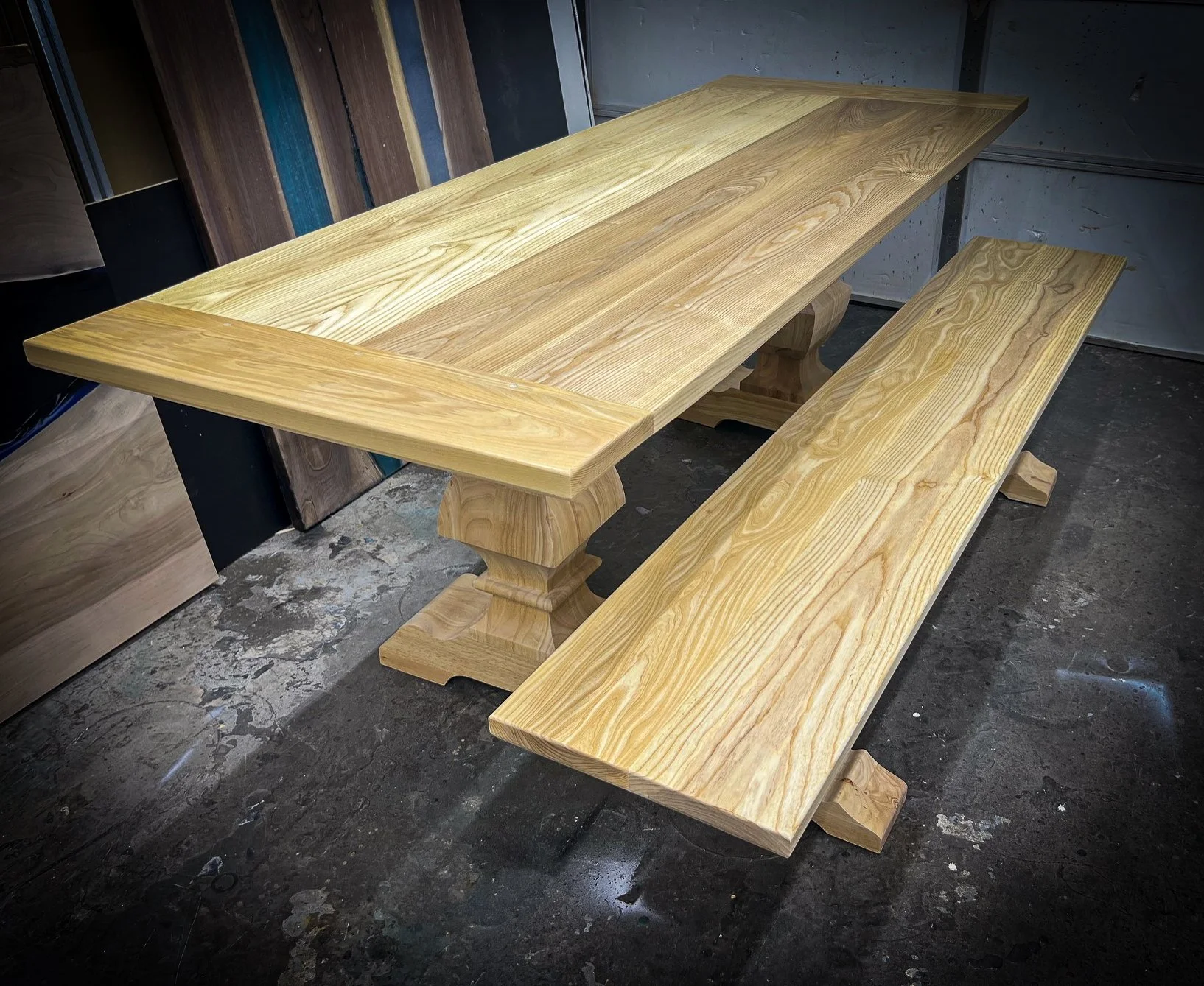 A 40" x 80" solid ash table with a unique "baron" base. This piece was clear-finished to let the natural color of the wood shine.